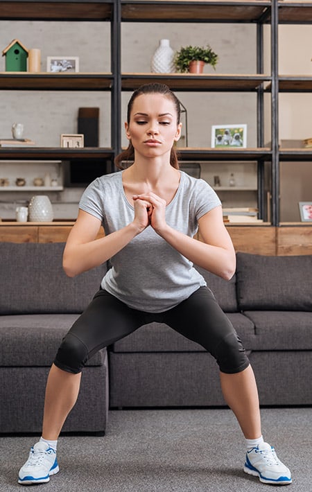 Exercising at home; squat pulses